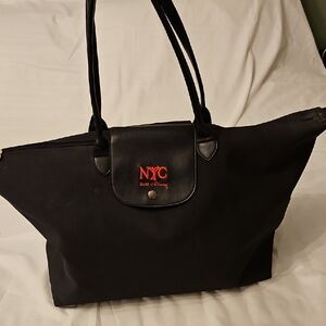 NYC World of Disney Black Tote with Red Logo